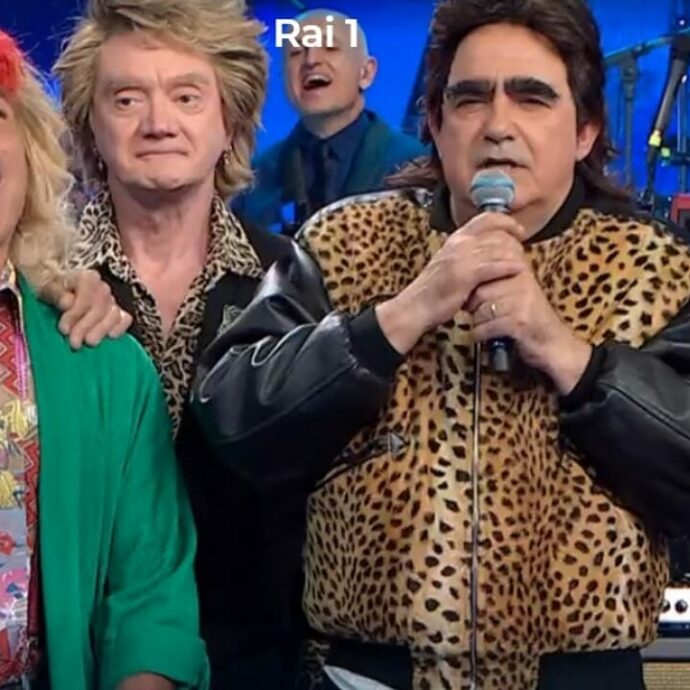 “Non so se sono viva: sono l’ologramma di me stessa”: il testo degli Elio sconvolge Milly Carlucci nella finale di Canzonissima