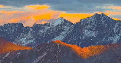 Copertina di Stelvio di cemento: arriva un hotel da 15mila metri cubi nel  cuore del Parco. Ricorso degli ambientalisti al Tar per fermare la costruzione in mezzo ai boschi