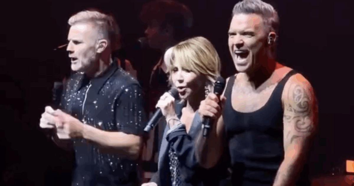 Reunion tra i Take That Robbie Williams e Gary Barlow alla Royal Albert  Hall: cantano “Relight My Fire” e vanno via mano nella mano – IL VIDEO