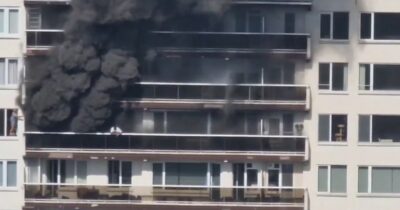 Copertina di La fuga disperata dal palazzo in fiamme ad Anversa, almeno cinque morti