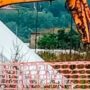 Copertina di Travolto da una ruspa durante lavori a Folgaria, muore un uomo di 83 anni