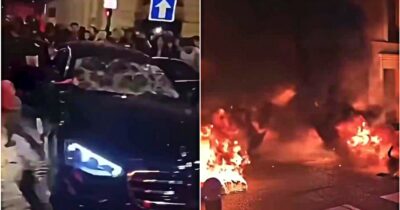 Copertina di Auto in fiamme, fuoco e scontri: caos a Parigi dopo l’eliminazione dal Mondiale