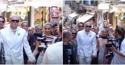 Copertina di Erling Haaland travolge Taormina con la fidanzata Isabel e una spilla forma di rana: il bomber del Manchester City stella (a sorpresa) della moda di Dolce & Gabbana