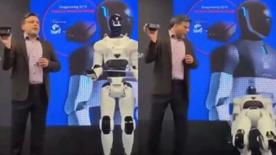 Copertina di Il robot umanoide si blocca e “muore” sul palco durante la sua presentazione al pubblico: gli addetti lo coprono con un telo nero e lo portano via sotto gli occhi sconvolti dei presenti – VIDEO
