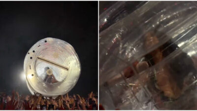 Copertina di “Portatemi al palco, oh mio dio!”: Katy Perry disperata finisce dentro una bottiglia gigante e il pubblico se la dimentica lì- IL VIDEO
