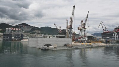 Copertina di Diga di Genova:  meno soldi sui monitoraggi ambientali, ma ci sono 30mila camion in più