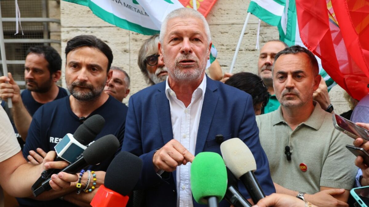 https://st.ilfattoquotidiano.it/wp-content/uploads/2026/08/06/Sperti_Uliano_De_Palma-1200x675.jpg