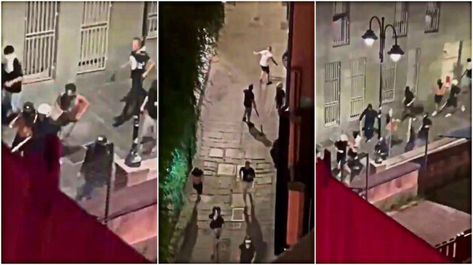 Spranghe, petardi e fumogeni: ultras incappucciati seminano il panico in centro, paura a Genova. Era una “spedizione punitiva” – Video
