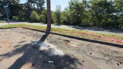 Copertina di Trovato morto in un parcheggio con segni di colpi di pistola: indagini per omicidio nel Varesotto
