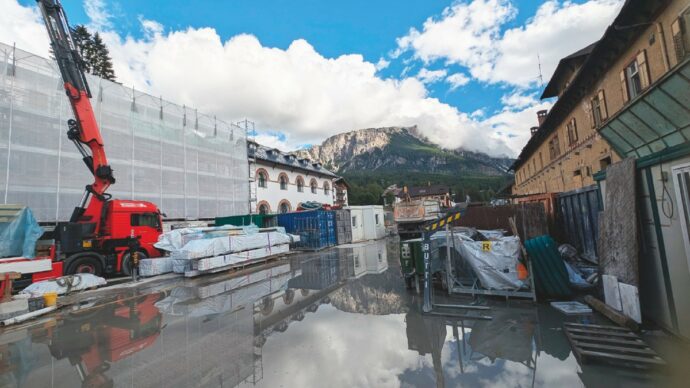 Cortina ’26: l’eredità dei giochi  è cemento. Una colata da 100 milioni a centro paese
