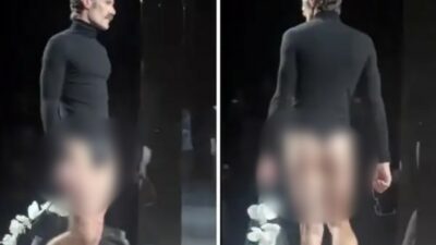 Copertina di Un perizoma a vista portato sotto al dolcevita, i modelli di Tom Ford alla Fashion Week di Parigi fanno discutere: “E’ un freakshow”